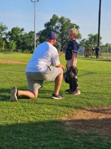 Ryan Blundell coaching a catcher